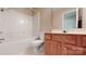 Bathroom featuring neutral-toned walls, vanity, toilet, and bathtub at 12222 Stratfield Place Cir, Pineville, NC 28134