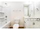 Traditional bathroom featuring a shower and tub combo, wooden floors, and a vanity at 123 Prestwick Way # 42, Mooresville, NC 28115