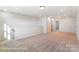 Neutral carpeted bonus room with multiple doorways and recessed lighting at 123 Prestwick Way # 42, Mooresville, NC 28115