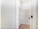 Walk-in closet with carpet flooring, door and wire shelving at 123 Prestwick Way # 42, Mooresville, NC 28115