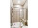 Modern bathroom featuring a glass-enclosed shower with tile walls and a built-in bench at 123 Prestwick Way # 42, Mooresville, NC 28115