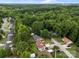 Aerial view of homes nestled among mature trees in a suburban neighborhood at 1333 Washington Ln, Kannapolis, NC 28083