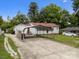 Charming single-story home featuring a carport and a well-maintained front yard at 1333 Washington Ln, Kannapolis, NC 28083