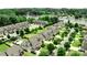 Stunning aerial view of 137 Flora Vista with lake access and lush landscaping in a desirable neighborhood at 137 Flora Vista Dr, Mooresville, NC 28117