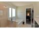 Bathroom with separate shower, tub, and open doorway to the bedroom at 137 Flora Vista Dr, Mooresville, NC 28117
