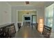 Open dining room layout with seamless transition to other living areas; hardwood floors at 137 Flora Vista Dr, Mooresville, NC 28117