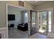 Welcoming foyer with hardwood floors and a glimpse of the living room with natural light at 137 Flora Vista Dr, Mooresville, NC 28117