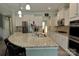 Spacious kitchen with a granite island, stainless steel appliances, and ample cabinet space at 137 Flora Vista Dr, Mooresville, NC 28117