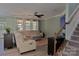 Bright living room with large sectional sofa, ceiling fan, and lots of natural light at 137 Flora Vista Dr, Mooresville, NC 28117