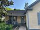 Charming home featuring a cozy front porch with vintage-style railings, providing a welcoming entrance at 142 Wylie St, Chester, SC 29706
