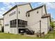 Spacious backyard with a patio, seating, and outdoor cooking area, perfect for entertaining at 14228 Twin Eagles Ln, Charlotte, NC 28278
