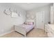 Bright bedroom with carpet floors and a comfortable single bed at 14228 Twin Eagles Ln, Charlotte, NC 28278