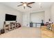Versatile bonus room with entertainment setup and comfortable seating at 14228 Twin Eagles Ln, Charlotte, NC 28278