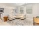 Inviting living area with a large sectional sofa and patterned rug at 14228 Twin Eagles Ln, Charlotte, NC 28278