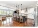 Open concept living space with kitchen island, modern appliances and view of the living room at 14228 Twin Eagles Ln, Charlotte, NC 28278