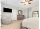 Spacious bedroom with plush carpeting and contemporary furnishings at 14228 Twin Eagles Ln, Charlotte, NC 28278