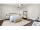 Spacious bedroom with a ceiling fan and cozy furniture at 1446 Downs Ave, Charlotte, NC 28205