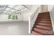 Attached garage with wooden stairs at 1446 Downs Ave, Charlotte, NC 28205