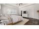 Spacious main bedroom with walk-in closet and hardwood floors at 1446 Downs Ave, Charlotte, NC 28205