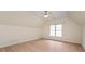 Bedroom featuring neutral walls, hardwood flooring, a ceiling fan, and a bright window at 1500 Tarrington Way, Wesley Chapel, NC 28079