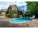 Beautiful in-ground pool, slide and patio area for outdoor enjoyment at 1500 Tarrington Way, Wesley Chapel, NC 28079