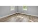 Bright bedroom with wood-look floors, neutral walls, and natural light at 1739 16Th Ne St, Hickory, NC 28601