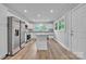 Spacious kitchen featuring stainless steel appliances, white cabinets and center island at 1739 16Th Ne St, Hickory, NC 28601