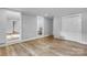 Bright living room has wood floors, neutral paint, and multiple doorways at 1739 16Th Ne St, Hickory, NC 28601