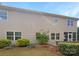 Spacious backyard with lush landscaping, a screened in porch, and a private serene atmosphere at 178 Wellshire St, Mooresville, NC 28115