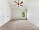 A sun filled main bedroom with vaulted ceiling, neutral decor, and a spacious layout at 178 Wellshire St, Mooresville, NC 28115