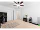 Bedroom featuring neutral carpet, a ceiling fan, and a built in fireplace at 1911 Savannah Hills Dr, Matthews, NC 28105