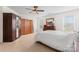 Bright bedroom with neutral carpet and closets for ample storage at 1911 Savannah Hills Dr, Matthews, NC 28105
