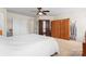 Bright bedroom featuring neutral carpet, with views of the en-suite bathroom at 1911 Savannah Hills Dr, Matthews, NC 28105