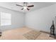 Empty bedroom featuring neutral carpet, a ceiling fan, and one window at 1911 Savannah Hills Dr, Matthews, NC 28105