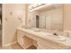 Bright bathroom featuring a vanity with double sinks, large mirror, and vanity area at 2011 20Th Street Ne Pl, Hickory, NC 28601