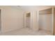 Neutral bedroom with plush carpeting, features double closets for ample storage at 2011 20Th Street Ne Pl, Hickory, NC 28601
