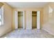 Bright bedroom with neutral carpet, double closets for storage, and comfortable living space at 2011 20Th Street Ne Pl, Hickory, NC 28601