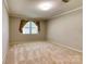 Spacious bedroom with neutral carpet, a window for natural light, and light paint at 2011 20Th Street Ne Pl, Hickory, NC 28601