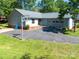 Well-maintained single-story home with a spacious driveway and attached two-car garage at 2011 20Th Street Ne Pl, Hickory, NC 28601
