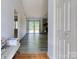 Inviting foyer with wood floors, leading to a living space with access to a wooden deck at 2011 20Th Street Ne Pl, Hickory, NC 28601