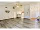 View of the spacious living room with a half wall, leading to the entryway and dining area at 2011 20Th Street Ne Pl, Hickory, NC 28601
