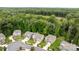 Aerial view of a neighborhood showcasing well-maintained homes and lush greenery at 20307 Creek Bend Edge Ct # 10, Matthews, NC 28105