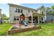Spacious backyard with play area, including a slide and swing set, ideal for families at 20307 Creek Bend Edge Ct # 10, Matthews, NC 28105