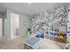 Bedroom featuring a graphic wall, providing a creative backdrop for play and learning at 20307 Creek Bend Edge Ct # 10, Matthews, NC 28105
