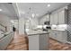 Modern kitchen with granite countertops, stainless steel appliances, and open layout at 20307 Creek Bend Edge Ct # 10, Matthews, NC 28105