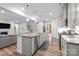 Spacious kitchen with granite counters, stainless appliances, and open floor plan at 20307 Creek Bend Edge Ct # 10, Matthews, NC 28105