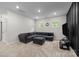 Inviting living area with plush sectional couch and contemporary entertainment setup at 20307 Creek Bend Edge Ct # 10, Matthews, NC 28105