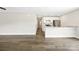 Open-concept living area showcases sleek hardwood floors, recessed lighting, and a modern kitchen at 209 S Gregory St # 3, Lancaster, SC 29720