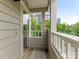 Balcony with views of tree-lined street, sidewalks and nearby buildings at 212 W 10Th St # 3, Charlotte, NC 28202