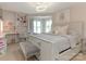 Bright bedroom with a desk nook, hardwood floors, a modern light fixture, and large windows at 212 W 10Th St # 3, Charlotte, NC 28202